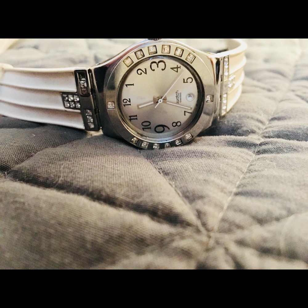Swatch white women’s watch.